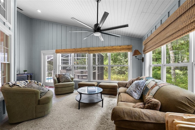 5434 SW 91st Ter, Gainesville, FL 32608 - living room featuring ceiling fan, tile patterned floors, high vaulted ceiling, wooden walls, and wood ceiling