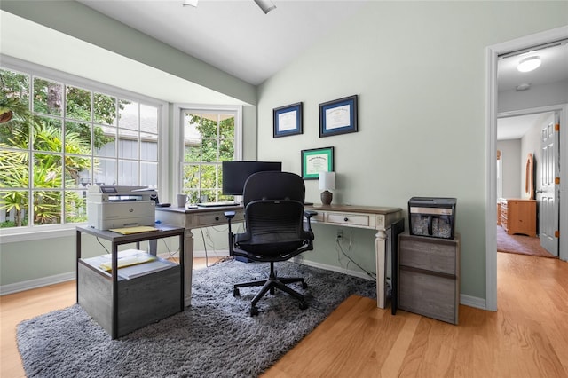 5434 SW 91st Ter, Gainesville, FL 32608 - office with wood finished floors, lofted ceiling, and baseboards