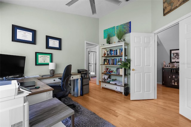 5434 SW 91st Ter, Gainesville, FL 32608 - office featuring a ceiling fan, light wood-style floors, and vaulted ceiling