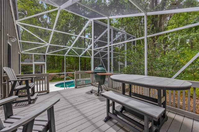 5434 SW 91st Ter, Gainesville, FL 32608 - wooden deck featuring an outdoor pool and glass enclosure