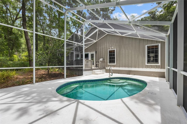 5434 SW 91st Ter, Gainesville, FL 32608 - swimming pool featuring a patio and glass enclosure
