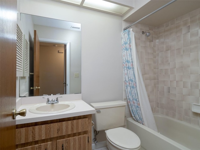 3703 NW 107th Ter, Gainesville, FL 32606 - bathroom featuring toilet, vanity, and shower / tub combo