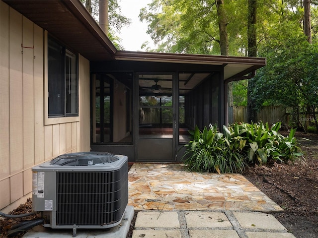 3703 NW 107th Ter, Gainesville, FL 32606 - view of patio with a sunroom, cooling unit, and french doors