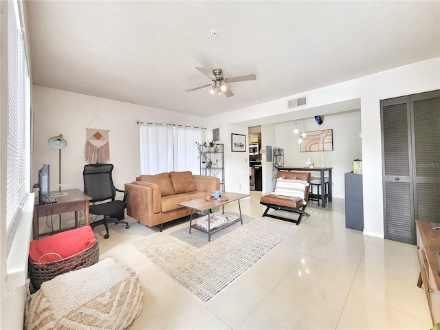 2360 SW Archer Rd Unit 101, Gainesville, FL 32608 - living area with a ceiling fan and light tile patterned floors
