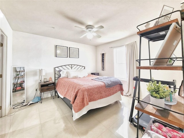 2360 SW Archer Rd Unit 101, Gainesville, FL 32608 - bedroom featuring light tile patterned flooring and a ceiling fan