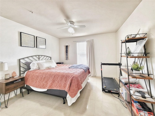 2360 SW Archer Rd Unit 101, Gainesville, FL 32608 - bedroom with light tile patterned floors and a ceiling fan