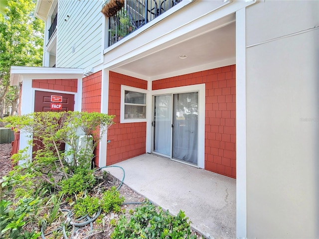 2360 SW Archer Rd Unit 101, Gainesville, FL 32608 - property entrance with a balcony
