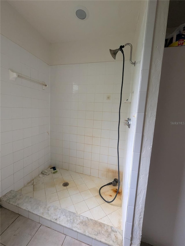5768 SW 52nd Ter, Lake Butler, FL 32054 - bathroom featuring tile patterned flooring and a tile shower