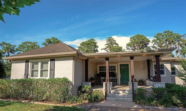 18101 Boy Scout Rd, Odessa, FL 33556 - view of front facade featuring stucco siding and covered porch