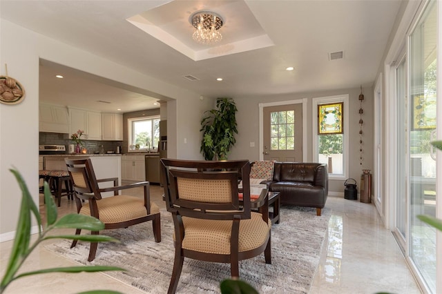 18101 Boy Scout Rd, Odessa, FL 33556 - living area featuring recessed lighting, light marble finish floors, a chandelier, and baseboards