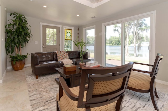 18101 Boy Scout Rd, Odessa, FL 33556 - dining area featuring baseboards, recessed lighting, a water view, and light tile patterned floors