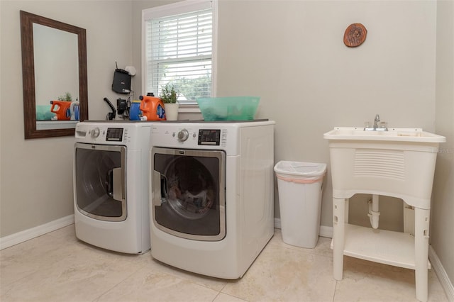18101 Boy Scout Rd, Odessa, FL 33556 - laundry room featuring separate washer and dryer and baseboards