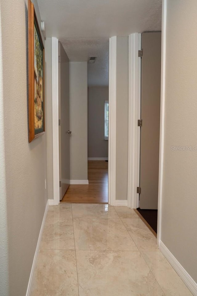 18101 Boy Scout Rd, Odessa, FL 33556 - hallway featuring baseboards
