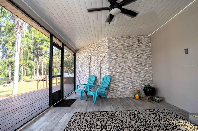 18101 Boy Scout Rd, Odessa, FL 33556 - unfurnished sunroom with a ceiling fan and lofted ceiling