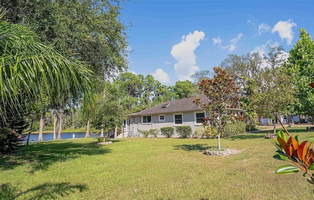 18101 Boy Scout Rd, Odessa, FL 33556 - view of grassy yard with a water view