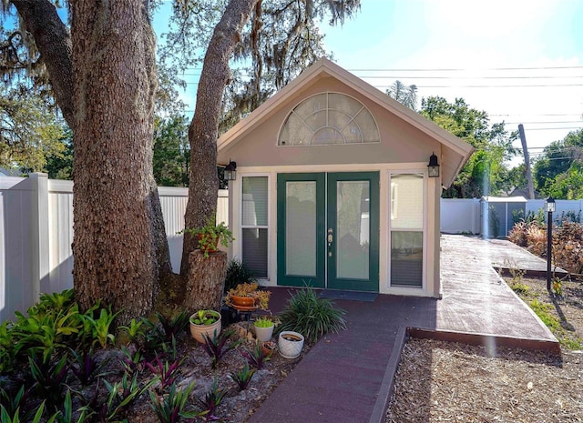 18101 Boy Scout Rd, Odessa, FL 33556 - view of exterior entry with stucco siding and a patio