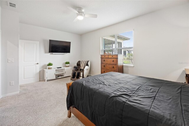 9478 SW 52nd Loop, Ocala, FL 34481 - carpeted bedroom featuring a ceiling fan