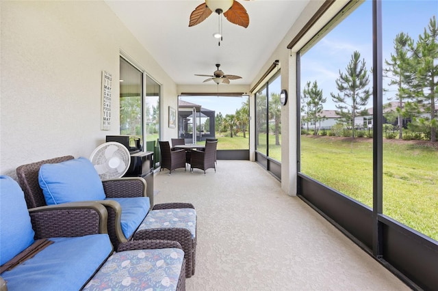 9478 SW 52nd Loop, Ocala, FL 34481 - sunroom featuring ceiling fan