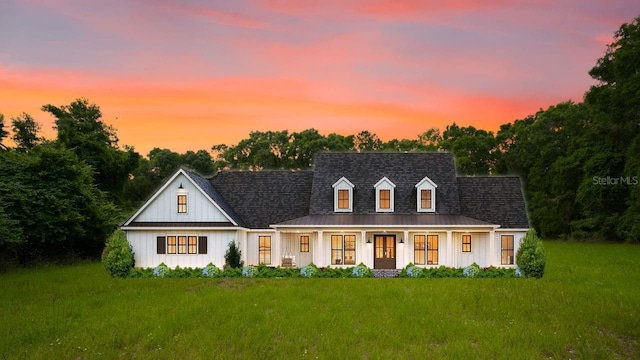 TBD NW 206th Cir, High Springs, FL 32643 - modern farmhouse with board and batten siding, a front lawn, and covered porch