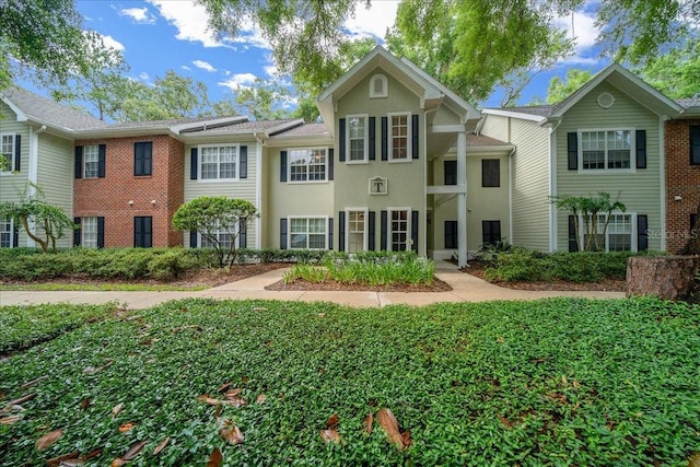 10000 SW 52nd Ave Unit 120, Gainesville, FL 32608 - view of front of home with stucco siding