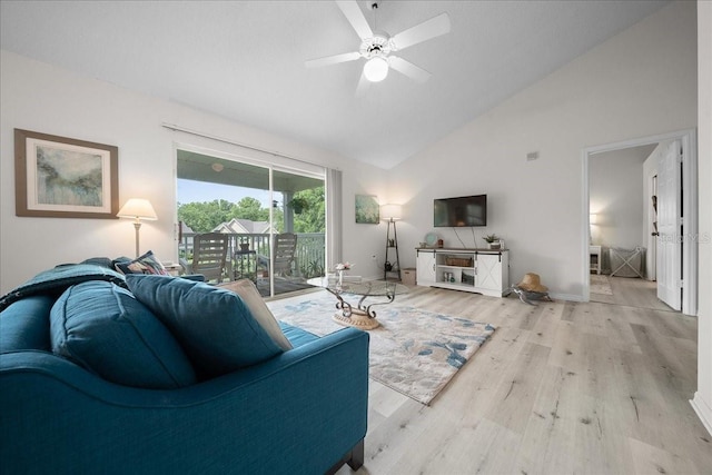10000 SW 52nd Ave Unit 120, Gainesville, FL 32608 - living room with high vaulted ceiling, wood finished floors, ceiling fan, and baseboards