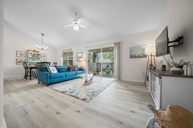 10000 SW 52nd Ave Unit 120, Gainesville, FL 32608 - living area featuring light wood-style floors, a chandelier, ceiling fan, baseboards, and high vaulted ceiling