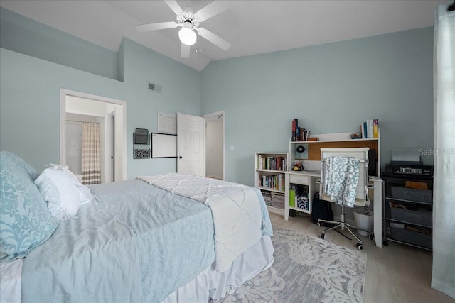 10000 SW 52nd Ave Unit 120, Gainesville, FL 32608 - bedroom featuring wood finished floors, high vaulted ceiling, a ceiling fan, and an office area