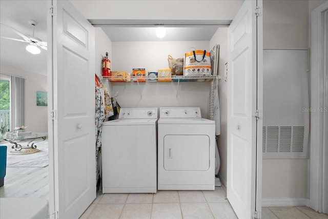 10000 SW 52nd Ave Unit 120, Gainesville, FL 32608 - laundry area with separate washer and dryer and baseboards