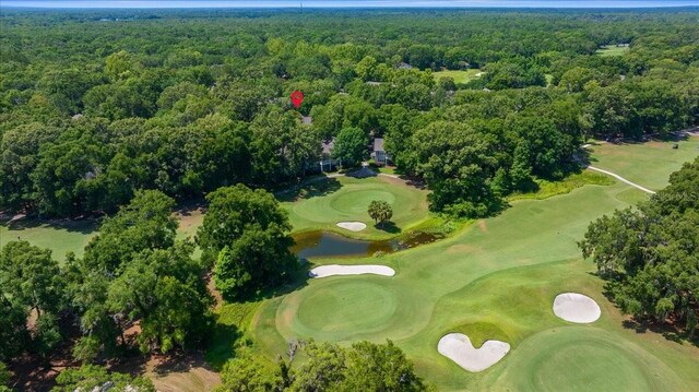 10000 SW 52nd Ave Unit 120, Gainesville, FL 32608 - aerial view of property and surrounding area featuring a local golf course, a large body of water, and a forest