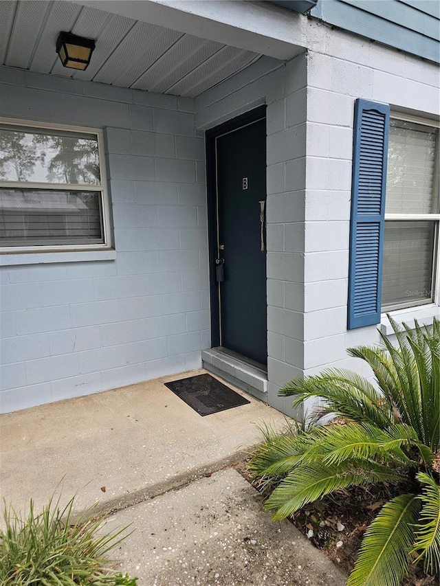 4007 SW 26th Ter Unit B, Gainesville, FL 32608 - property entrance featuring concrete block siding