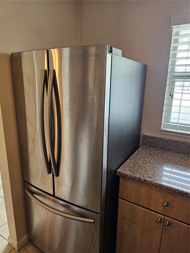 4007 SW 26th Ter Unit B, Gainesville, FL 32608 - kitchen view of freestanding refrigerator and dark stone counters