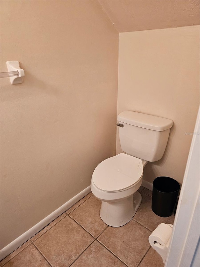 4007 SW 26th Ter Unit B, Gainesville, FL 32608 - bathroom featuring toilet, tile patterned flooring, and baseboards