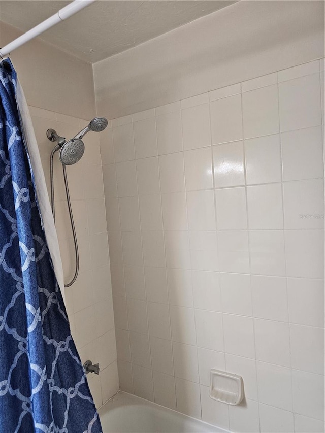 4007 SW 26th Ter Unit B, Gainesville, FL 32608 - bathroom featuring shower / bath combo