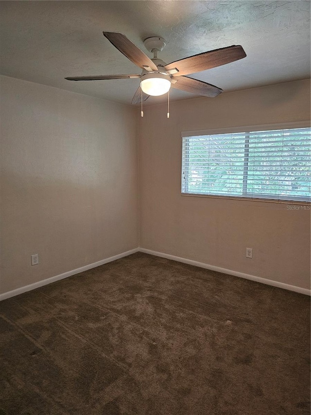 4007 SW 26th Ter Unit B, Gainesville, FL 32608 - spare room with carpet flooring, ceiling fan, and baseboards