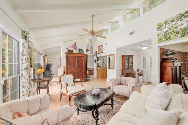 12832 SW 14th Ave, Newberry, FL 32669 - living room with tile patterned flooring, beamed ceiling, high vaulted ceiling, and a ceiling fan