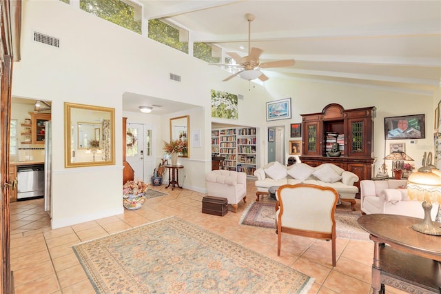 12832 SW 14th Ave, Newberry, FL 32669 - living area with light tile patterned flooring, high vaulted ceiling, a ceiling fan, and beamed ceiling