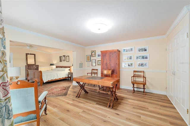 12832 SW 14th Ave, Newberry, FL 32669 - bedroom with light wood finished floors, ornamental molding, and baseboards