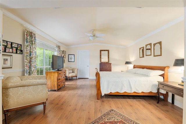 12832 SW 14th Ave, Newberry, FL 32669 - bedroom featuring light wood-style flooring, ornamental molding, lofted ceiling, and a ceiling fan