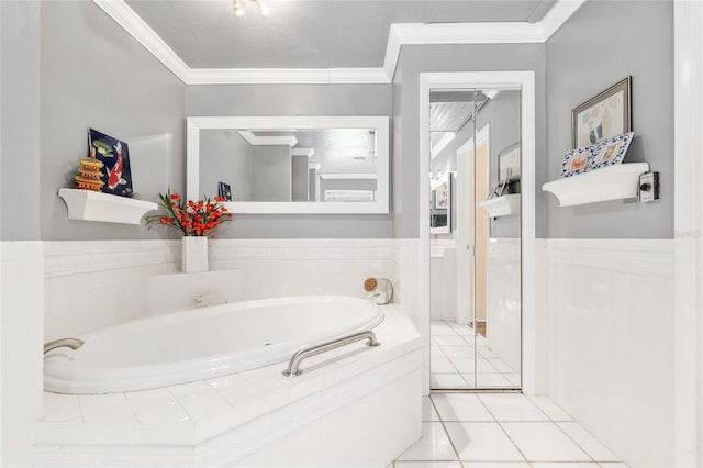 12832 SW 14th Ave, Newberry, FL 32669 - bathroom with a garden tub, ornamental molding, and tile patterned floors