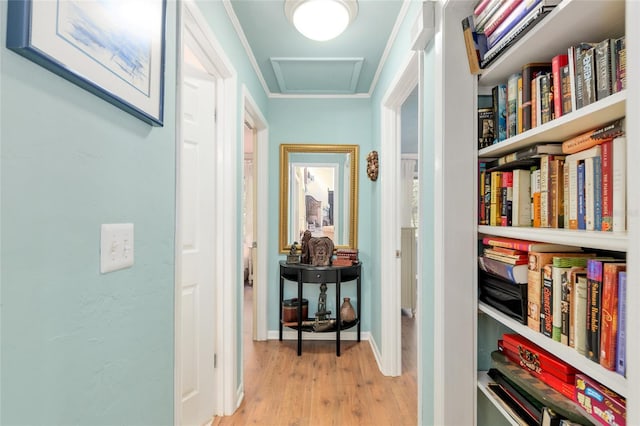 12832 SW 14th Ave, Newberry, FL 32669 - hallway featuring wood finished floors and attic access