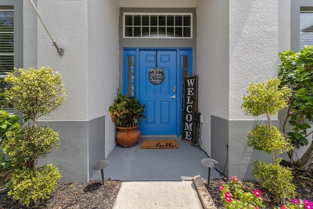 13365 Chesapeake Pl, Spring Hill, FL 34609 - view of exterior entry featuring stucco siding