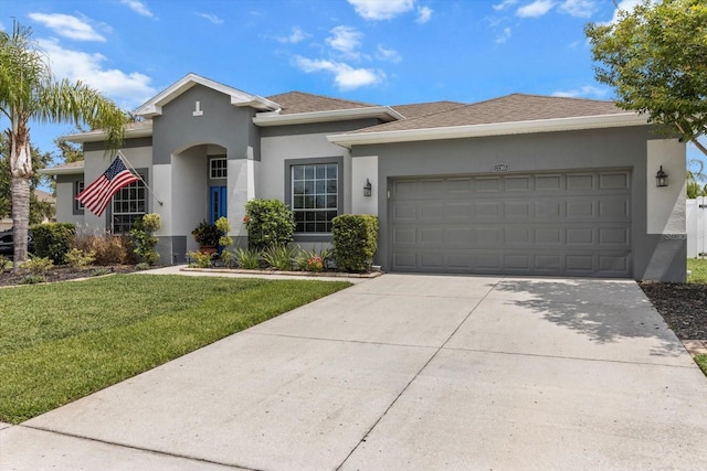 13365 Chesapeake Pl, Spring Hill, FL 34609 - view of front of home featuring stucco siding, an attached garage, a front yard, concrete driveway, and a shingled roof