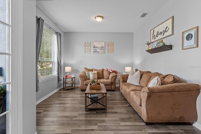 13365 Chesapeake Pl, Spring Hill, FL 34609 - living area with wood finished floors and baseboards