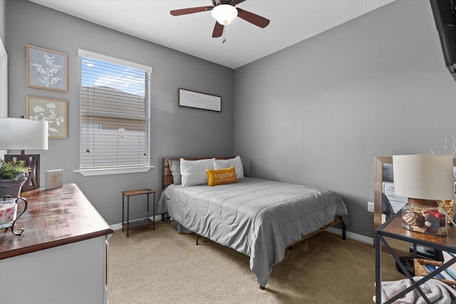 13365 Chesapeake Pl, Spring Hill, FL 34609 - bedroom featuring light carpet, baseboards, and ceiling fan