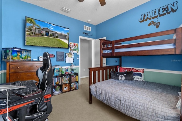 13365 Chesapeake Pl, Spring Hill, FL 34609 - carpeted bedroom with an office area and ceiling fan