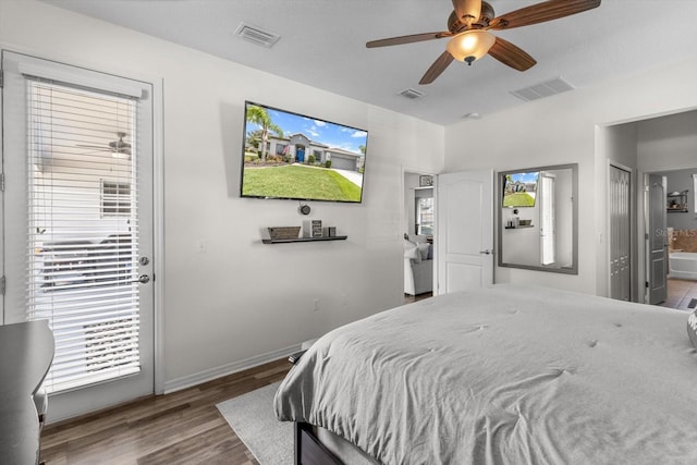 13365 Chesapeake Pl, Spring Hill, FL 34609 - bedroom featuring wood finished floors, connected bathroom, baseboards, and ceiling fan