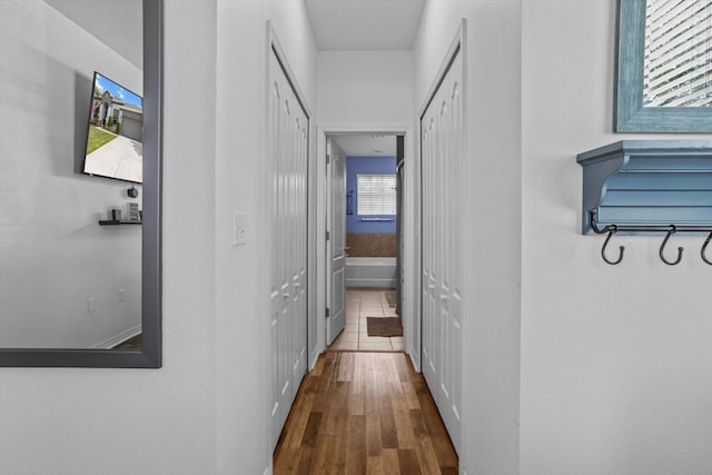 13365 Chesapeake Pl, Spring Hill, FL 34609 - corridor with wood finished floors