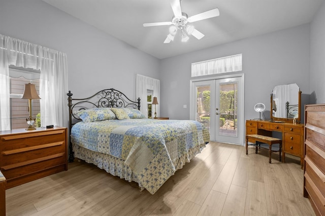 923 SW 85th Way, Gainesville, FL 32607 - bedroom with access to exterior, light wood-type flooring, french doors, and ceiling fan