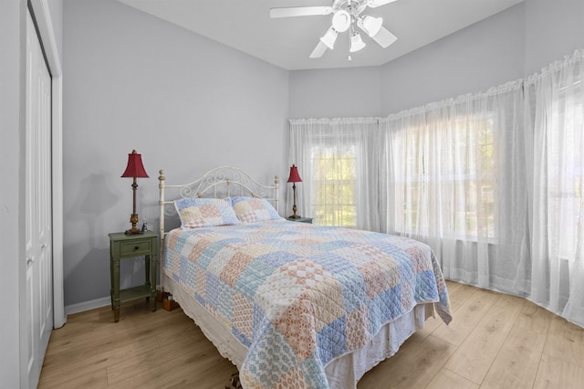 923 SW 85th Way, Gainesville, FL 32607 - bedroom with wood finished floors and ceiling fan