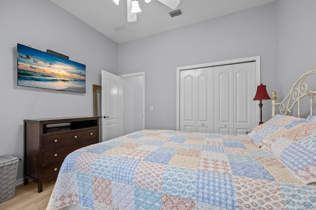 923 SW 85th Way, Gainesville, FL 32607 - bedroom featuring light wood-style floors, a closet, and ceiling fan